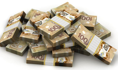 piles-de-billets-de-100-dollars-canadiens